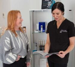 Emma J welcoming a client at Emma J aesthetics in Inverness