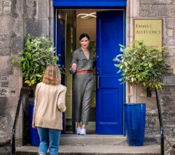 Emma J welcoming a client at Emma J aesthetics in Inverness